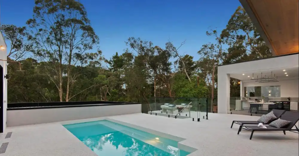 QED swimming pool and house design
